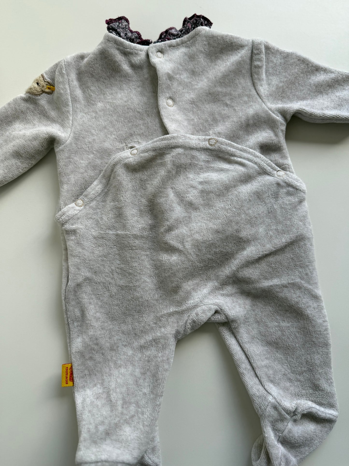 STEIFF Strampler Teddy grau lila 50