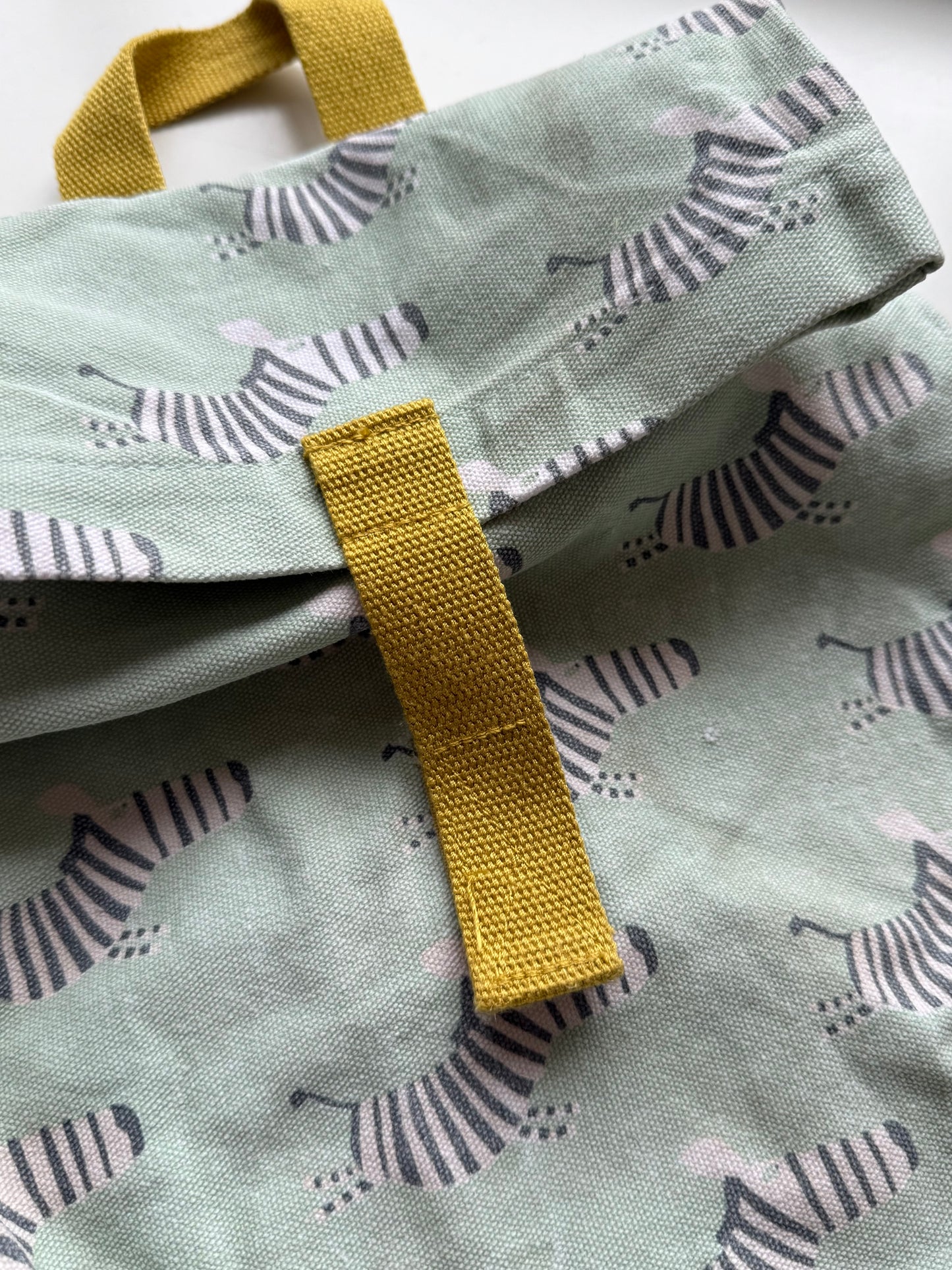 MAISON PETIT JOUR Rucksack Zebras Türkis gelb