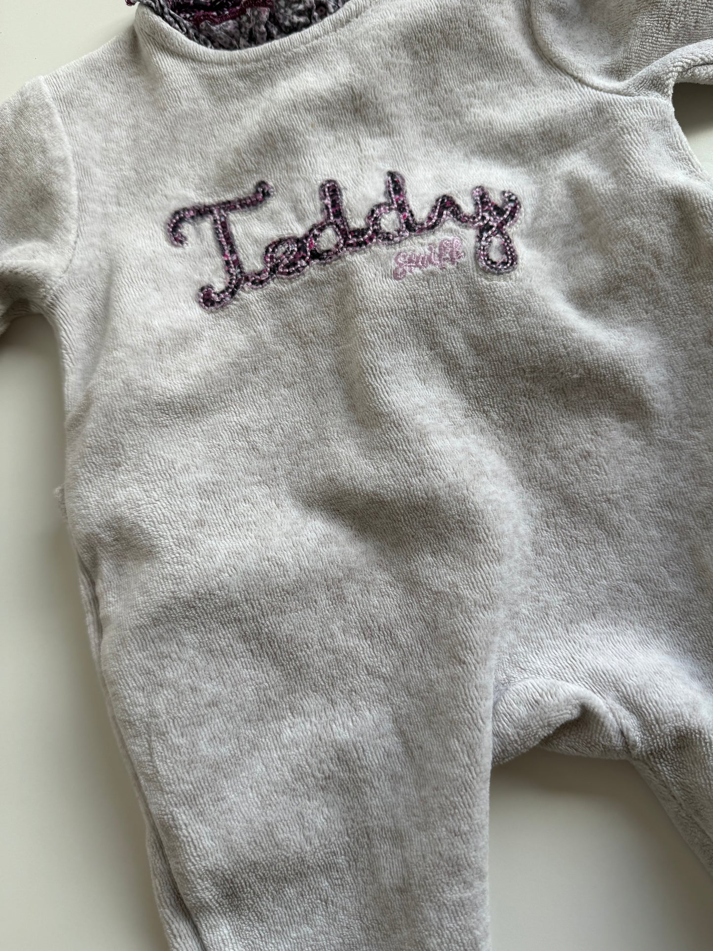 STEIFF Strampler Teddy grau lila 50